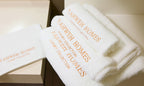 White towels with 'Yahweh Homes' branding.