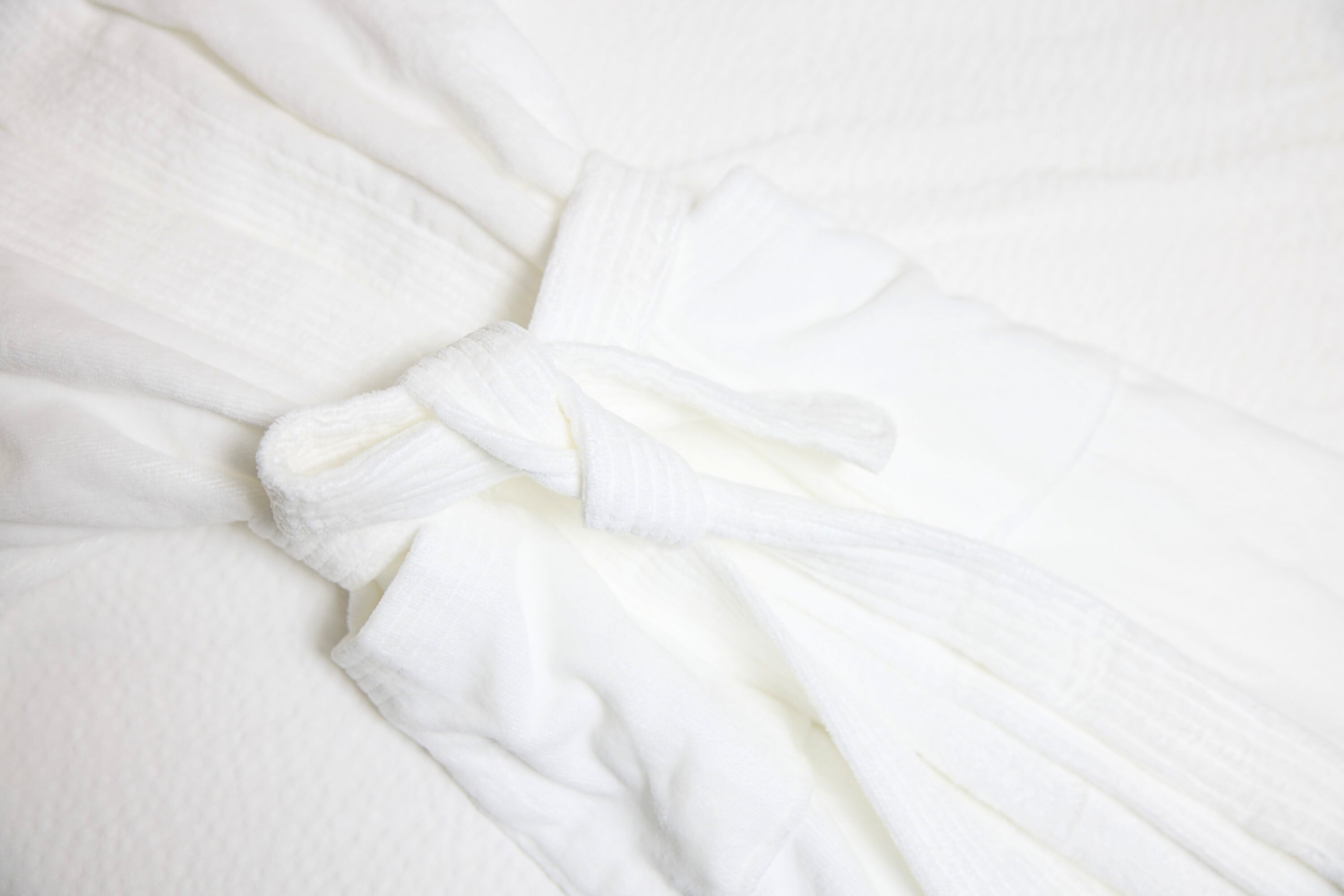 Close-up of white robe 