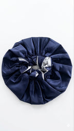 Navy blue satin hair Bonnet on a white background