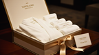 Elegant home spa gift set with premium towels and a cozy robe, designed for hotel-quality comfort at home.
