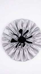 White Satin Hair Bonnet with black interior on a white background